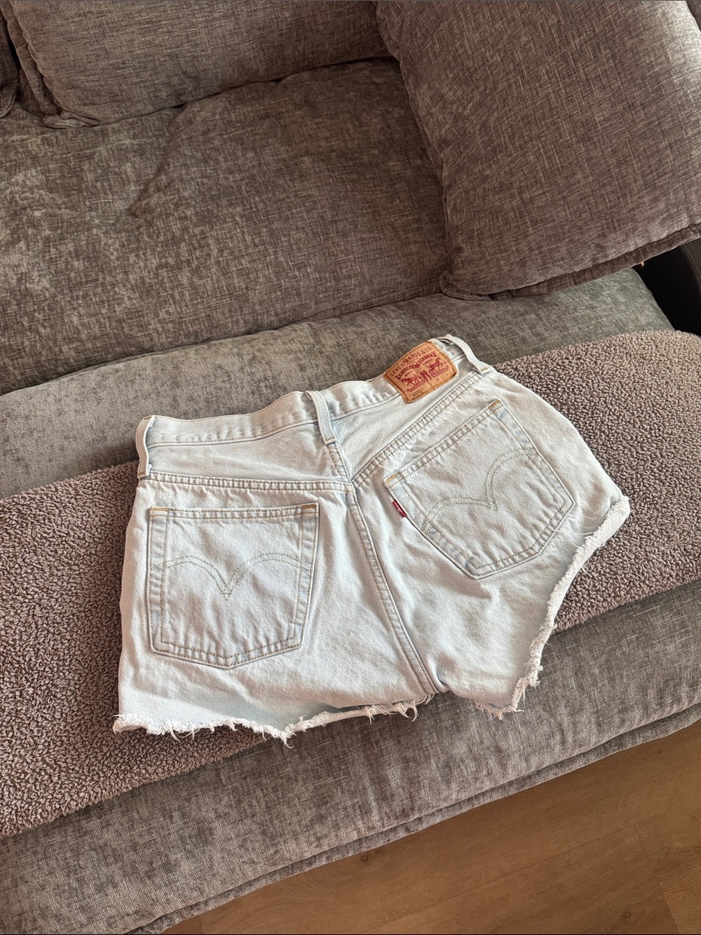 Levi's White Denim Cutoff Shorts with Frayed Hem